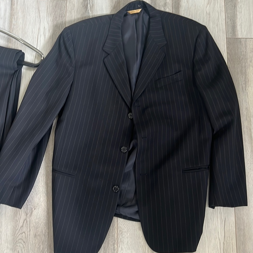 Dark blue men’s Donna Karan’s suit!